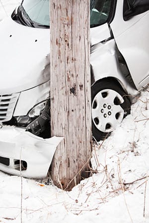 Car crashed into pole in the winter