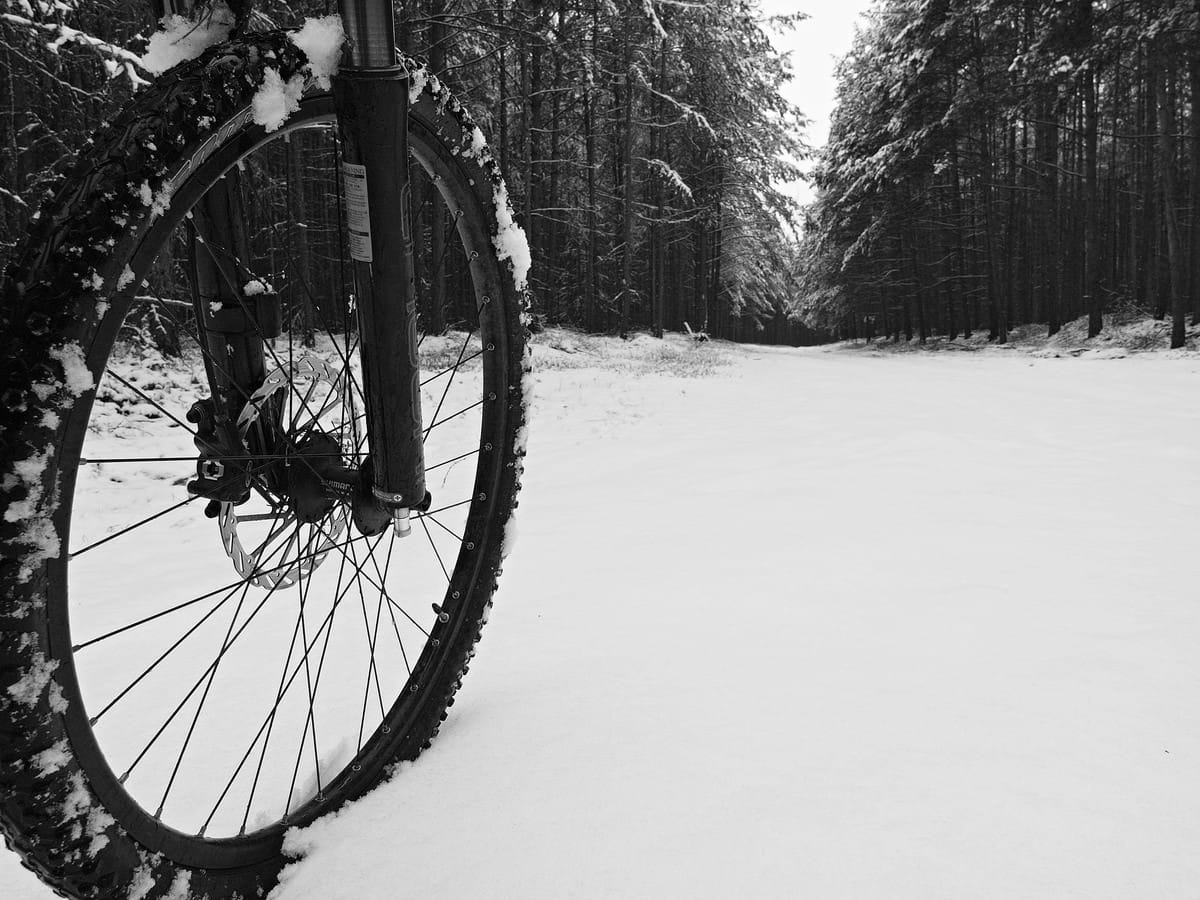 image of bike tire in snow personal injury lawyer colorado